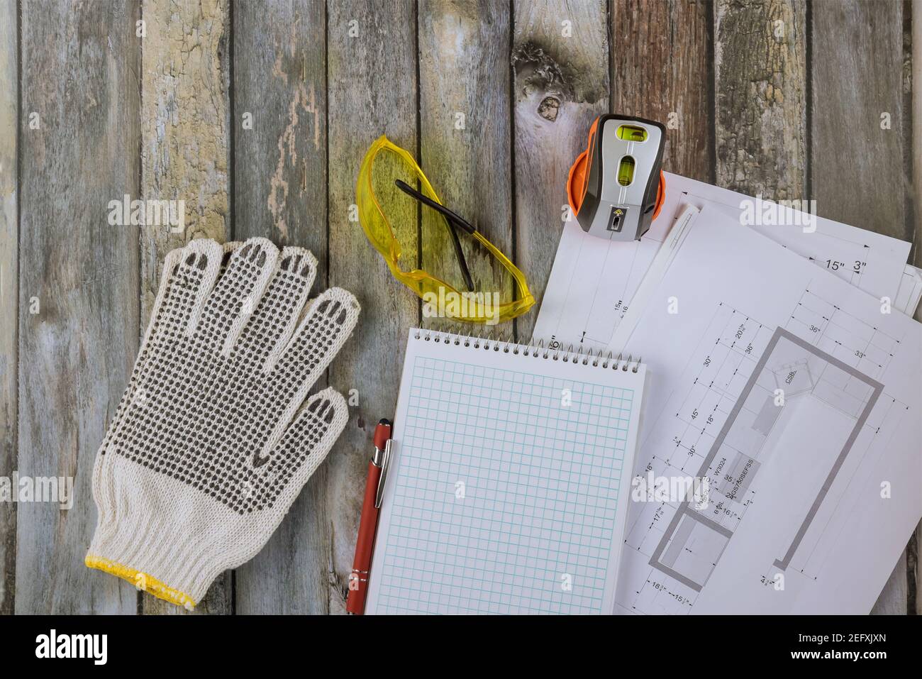 Architect designer engineer with kitchen design blueprint plan