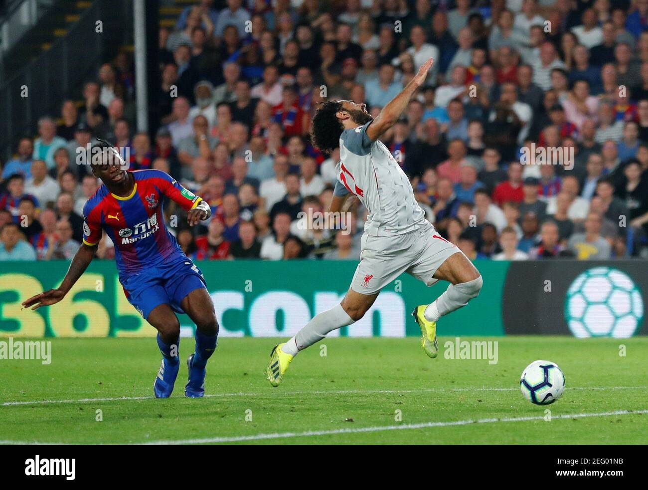 Soccer Football - Premier League - Crystal Palace v Liverpool - Selhurst Park, London, Britain - August 20, 2018  Crystal Palace's Aaron Wan-Bissaka concedes a foul against Liverpool's Mohamed Salah and is subsequently shown a red card by the referee                      REUTERS/Eddie Keogh  EDITORIAL USE ONLY. No use with unauthorized audio, video, data, fixture lists, club/league logos or 'live' services. Online in-match use limited to 75 images, no video emulation. No use in betting, games or single club/league/player publications.  Please contact your account representative for further det Stock Photo