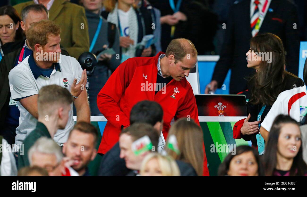 Rugby Union - England v Wales - IRB Rugby World Cup 2015 Pool A - Twickenham Stadium, London, England - 26/9/15  Britain's Prince Harry, Prince William and Catherine, Duchess of Cambridge in the stands  Reuters / Andrew Winning  Livepic Stock Photo