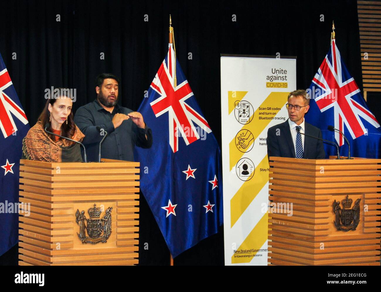 New Zealand's Prime Minister Jacinda Ardern and Director General of Health Ashley Bloomfield attend a news conference on the coronavirus disease (COVID-19) pandemic in Wellington, New Zealand, February 17, 2021. Picture taken February 17, 2021.   REUTERS/Praveen Menon Stock Photo