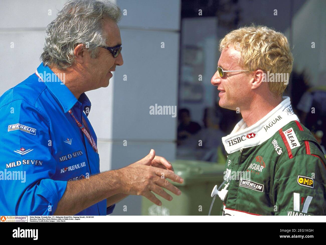 Motor Racing - Formula One - F1 - Malaysian Grand Prix , Sepang Circuit ,  15-18/3/01 Benetton Team Boss Flavio Briatore talks to Eddie Irvine -  Jaguar Mandatory Credit: Action Images / John Marsh Stock Photo - Alamy