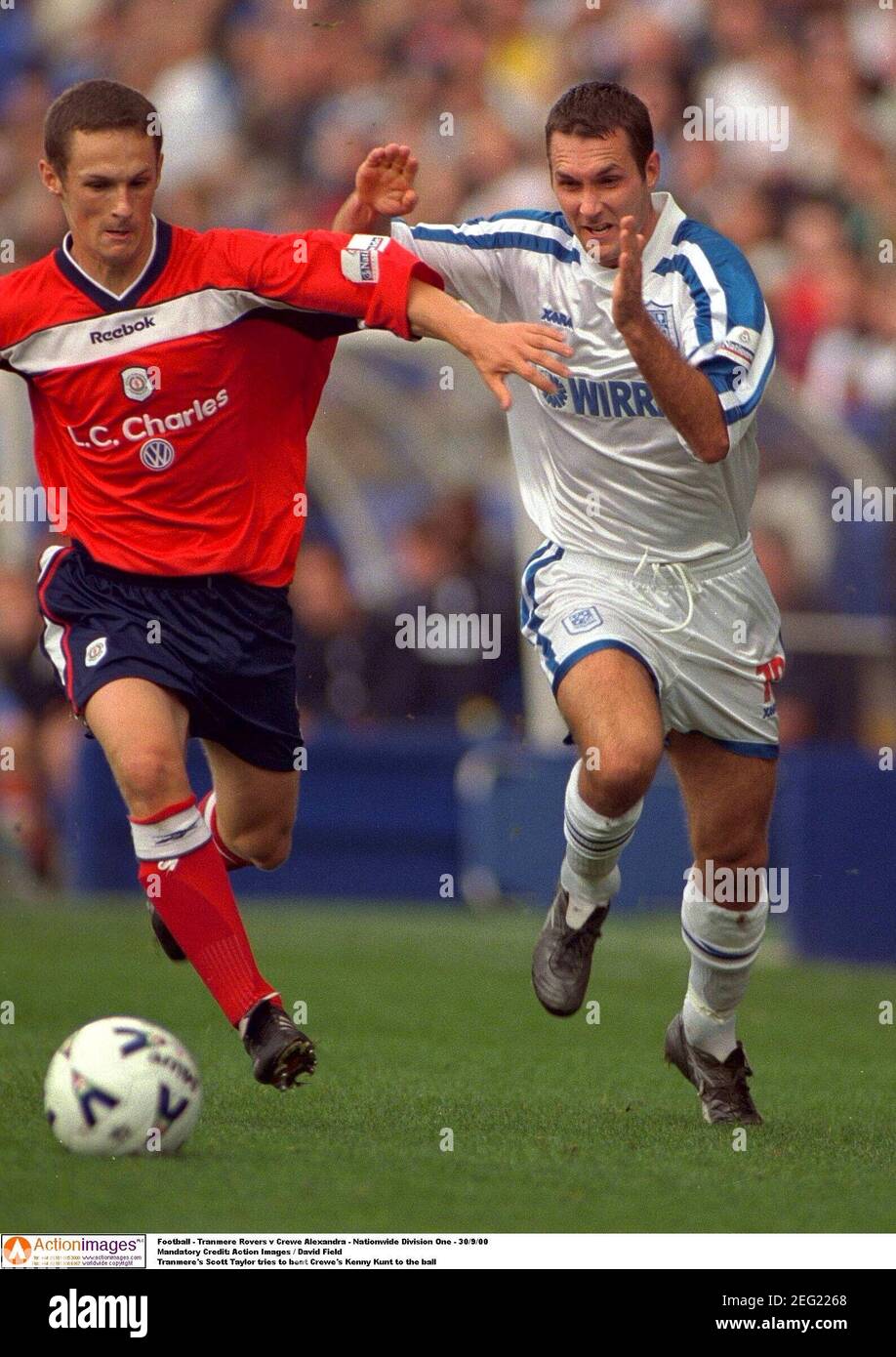 Football - Tranmere Rovers v Crewe Alexandra - Nationwide Division One - 30/9/00  Mandatory Credit: Action Images / David Field  Tranmere's Scott Taylor tries to beat Crewe's Kenny Kunt to the ball Stock Photo