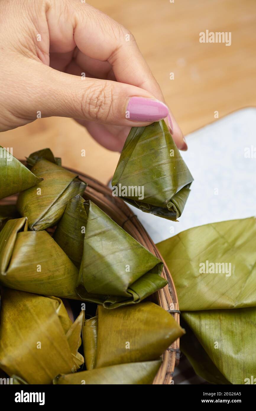 The traditional desserts wrapped in banana leaf Stock Photo Alamy