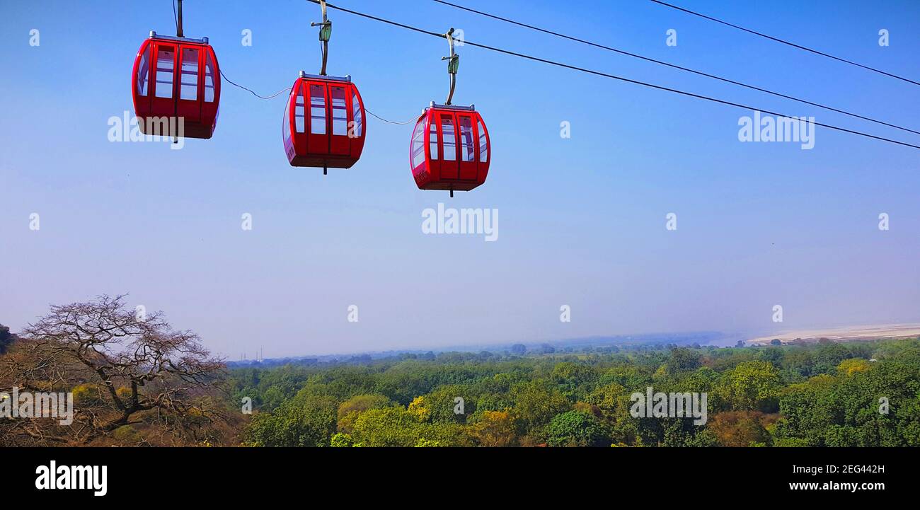 Rope cars providing service at the top of the Hill Stock Photo