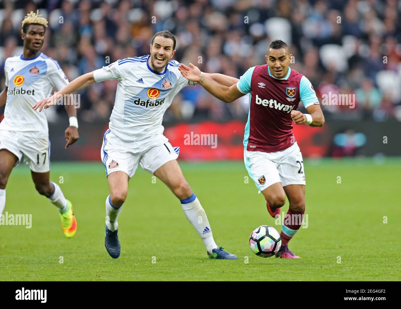 Britain Soccer Football - West Ham United v Sunderland - Premier League - London Stadium - 22/10/16 West Ham United's Dimitri Payet in action with Sunderland's John O'Shea Reuters / Paul Hackett Livepic EDITORIAL USE ONLY. No use with unauthorized audio, video, data, fixture lists, club/league logos or 'live' services. Online in-match use limited to 45 images, no video emulation. No use in betting, games or single club/league/player publications.  Please contact your account representative for further details. Stock Photo