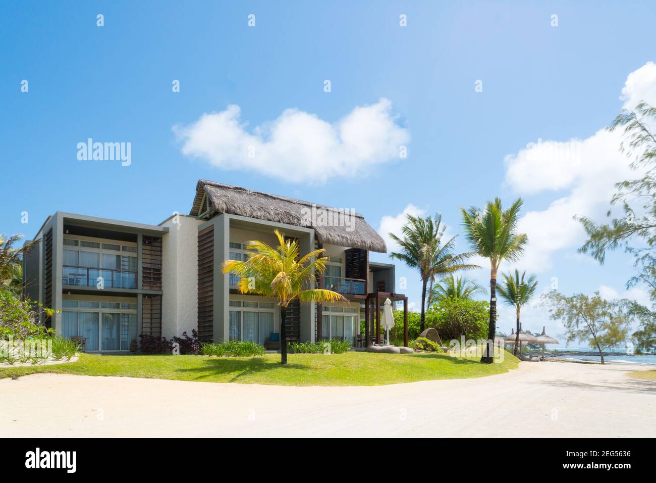 Resort hotel accommodation on the beach at Mauritius which is a tropical island Stock Photo