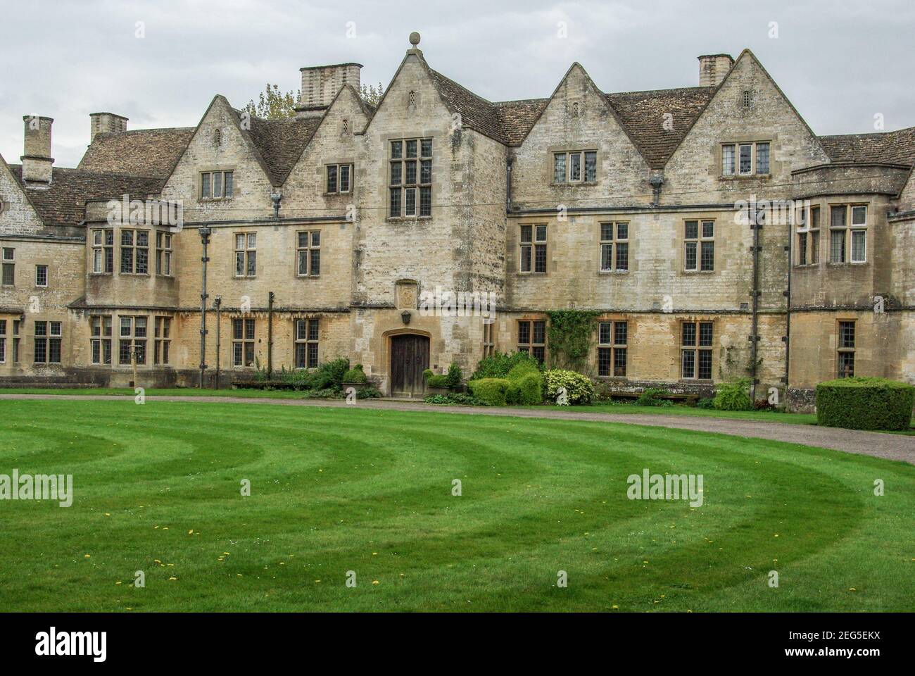 The frontage of Rodmarton Manor, an Arts and Crafts style house, near Cirencester, Gloucestershire, UK Stock Photo