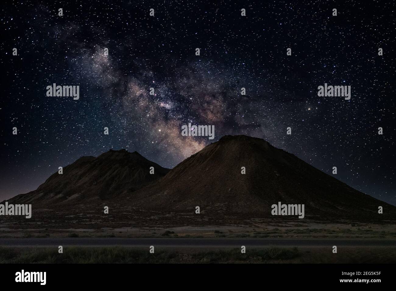 Milky way over hills, night landscape Stock Photo