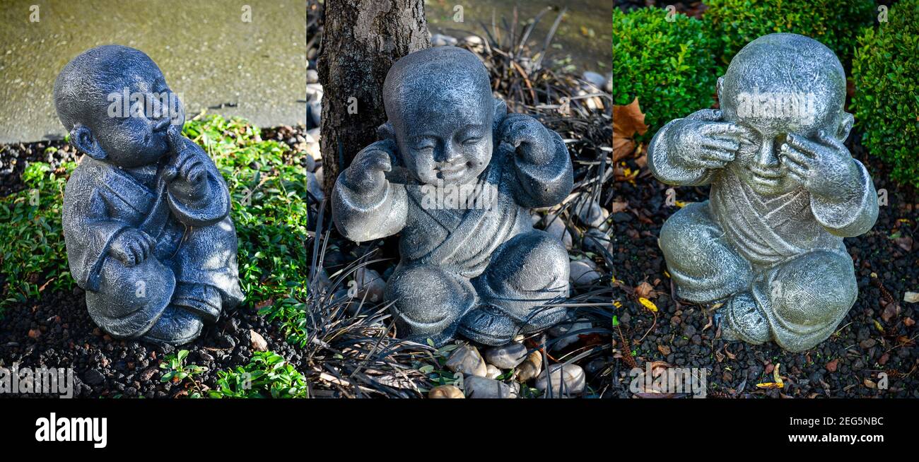 Three stone buddhist monks statues in a garden using hand action to