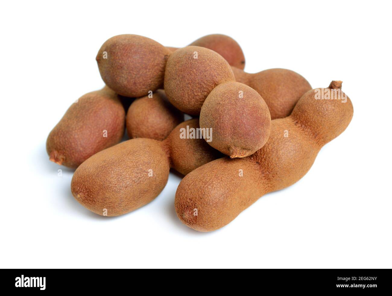 Ripe tamarind fruit isolated on white background Stock Photo Alamy