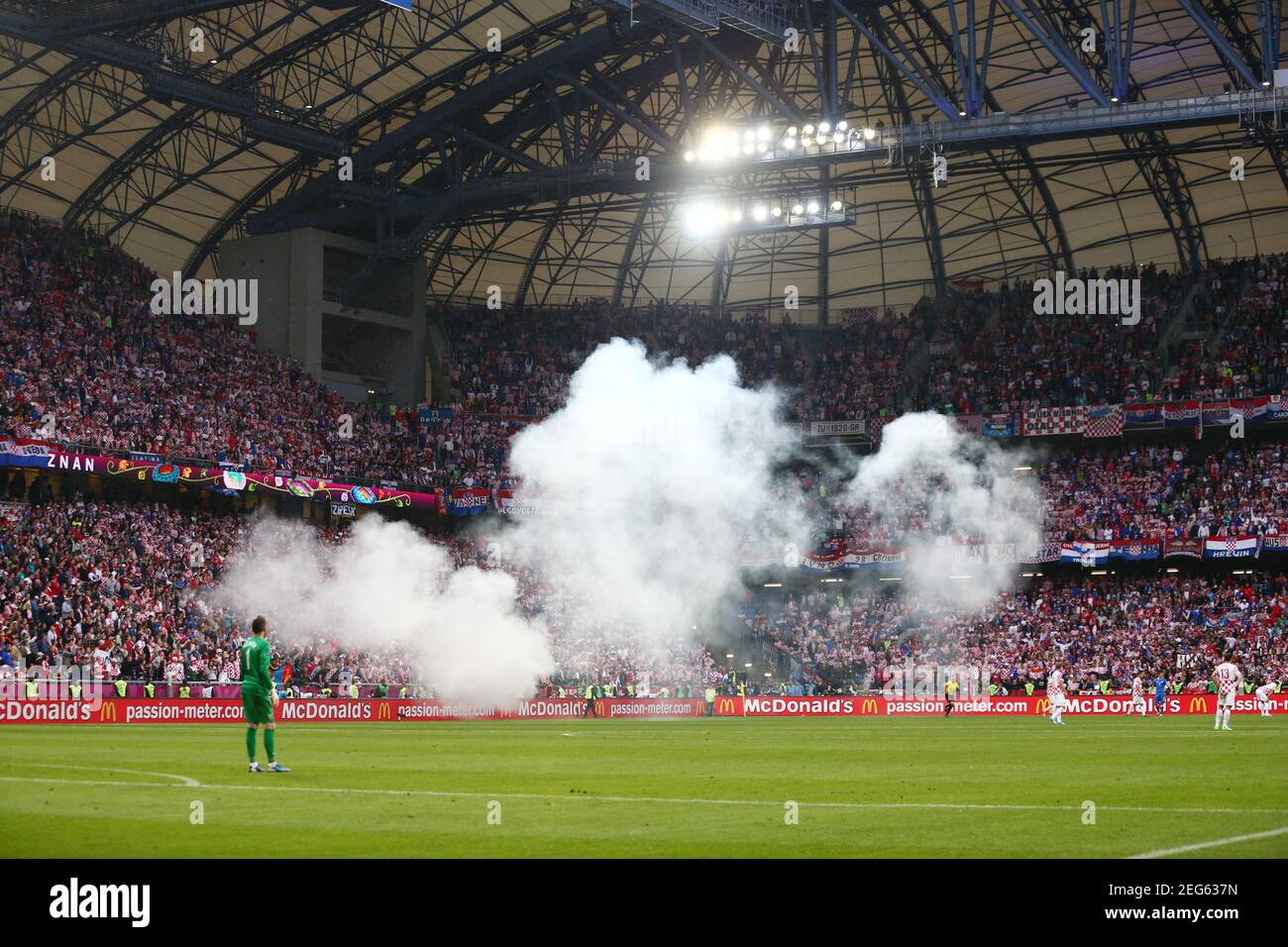 Football - Italy v Croatia - UEFA EURO 2012 Group C  - Municipal Stadium, Poznan, Poland - 14/6/12  General view as a flare is set off during the match  Mandatory Credit: Action Images / Jason Cairnduff  Livepic Stock Photo