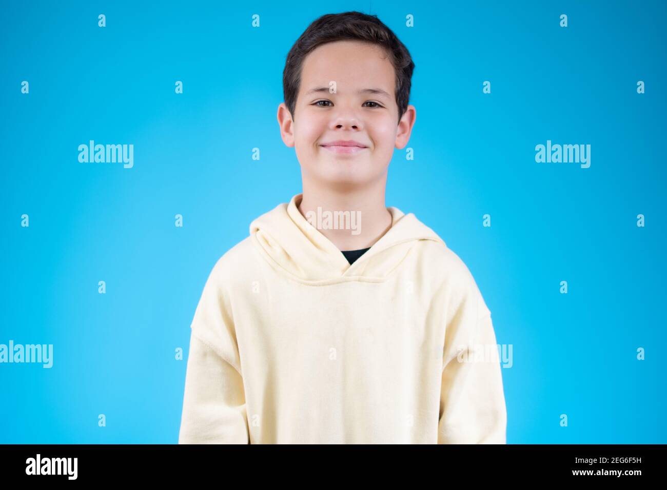 Photo of adorable young happy boy looking at camera Stock Photo - Alamy