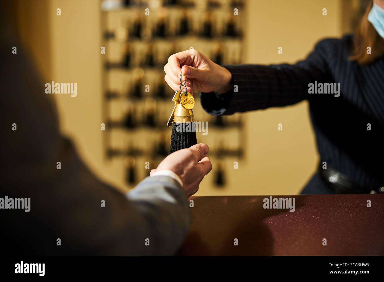 Key Guest Fragment photo of hotel guest receiving a key from room Stock Photo - Alamy