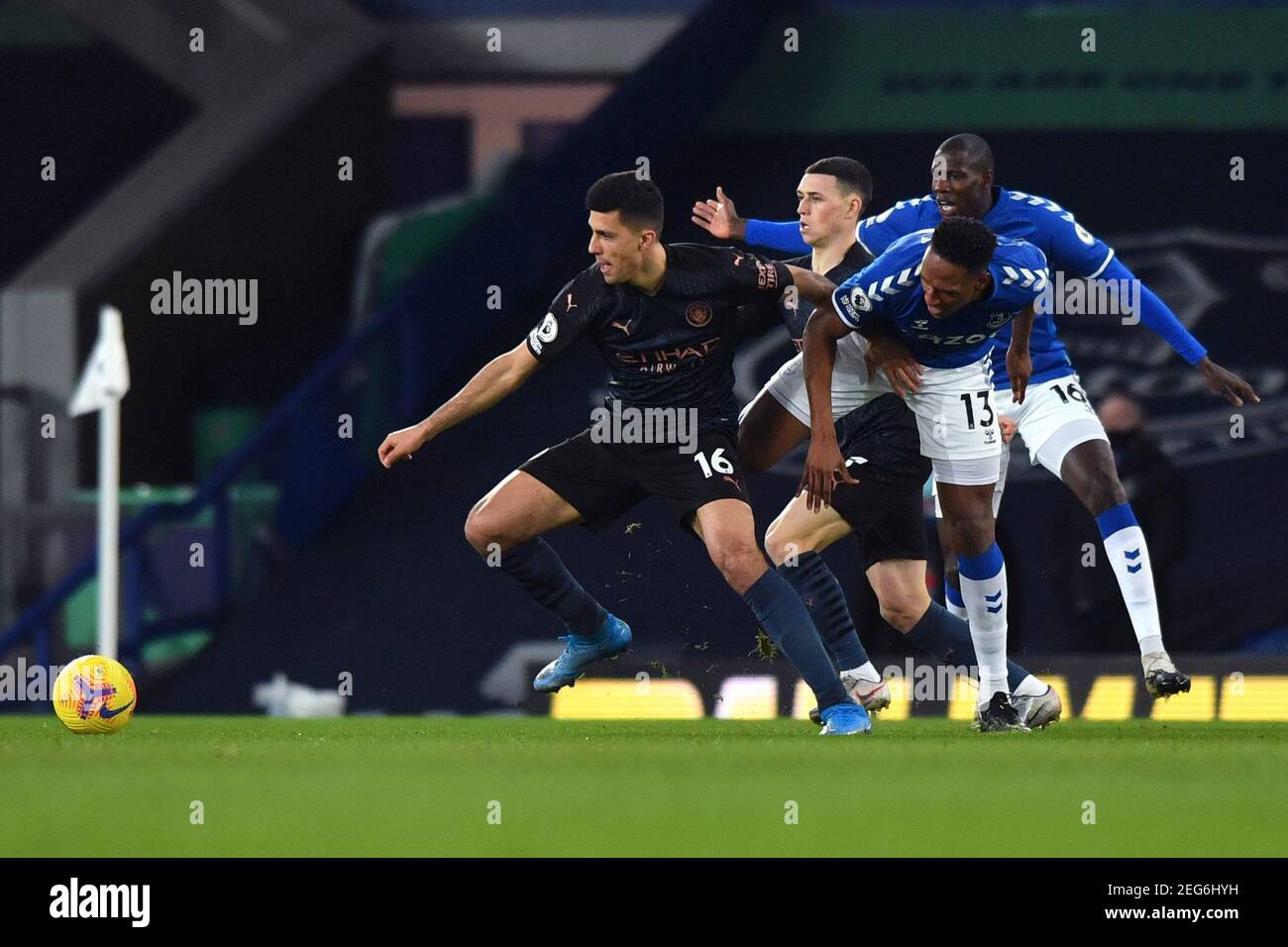 Liverpool, United Kingdom, 17th February 2021. Pictured left to right, Manchester City's Rodri and Manchester City's Phil Foden in action against Everton’s Yerry Mina and Everton’s Abdoulaye Doucoure. Credit: Anthony Devlin/Alamy Live News Stock Photo