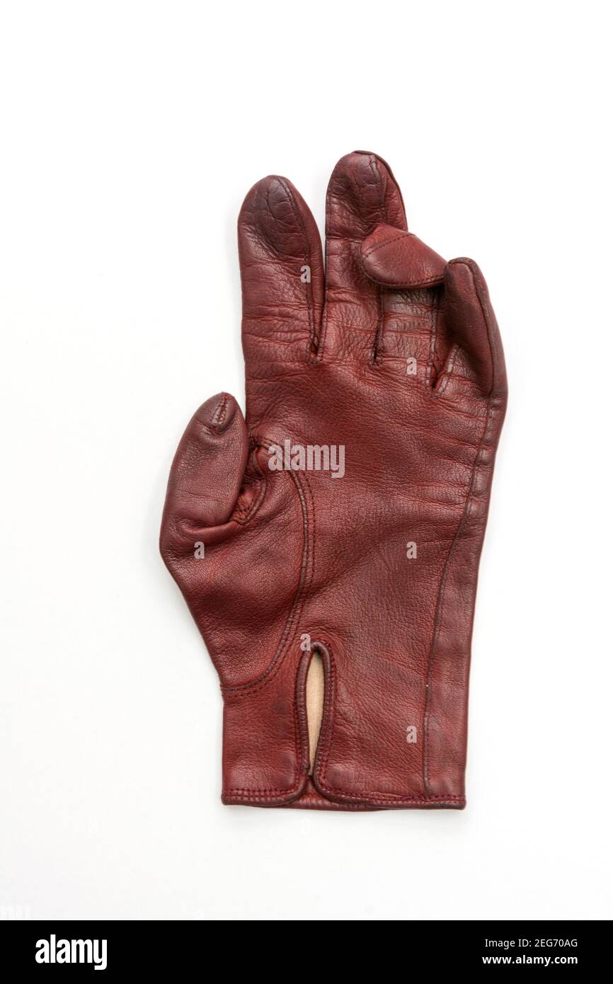 Maroon woman's glove, France Stock Photo Alamy