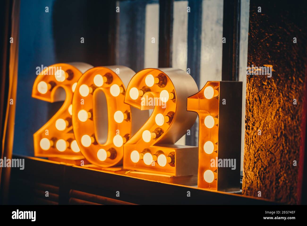 New Year 2021 Creative Design Concept numbers from yellow bulbs Stock Photo