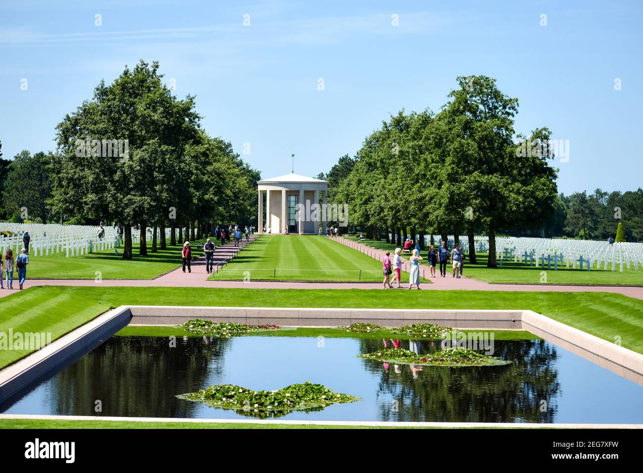 NORMANDY, FRANCE - July 5, 2017: Tourists visiting 'The Garden of the Missing' at the American Cemetery from the Battle of the Normandy Landings durin Stock Photo