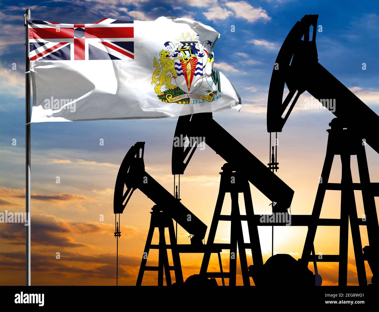 Oil rigs against the backdrop of the colorful sky and a flagpole with ...