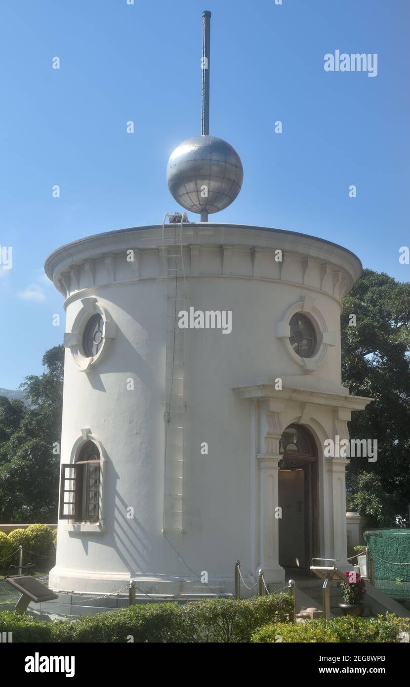 Signal Tower, aka Time Ball Tower,  was to exercise a ball drop daily at 1pm for ships in Victoria Harbor  to calibrate their marine chronometers. Stock Photo