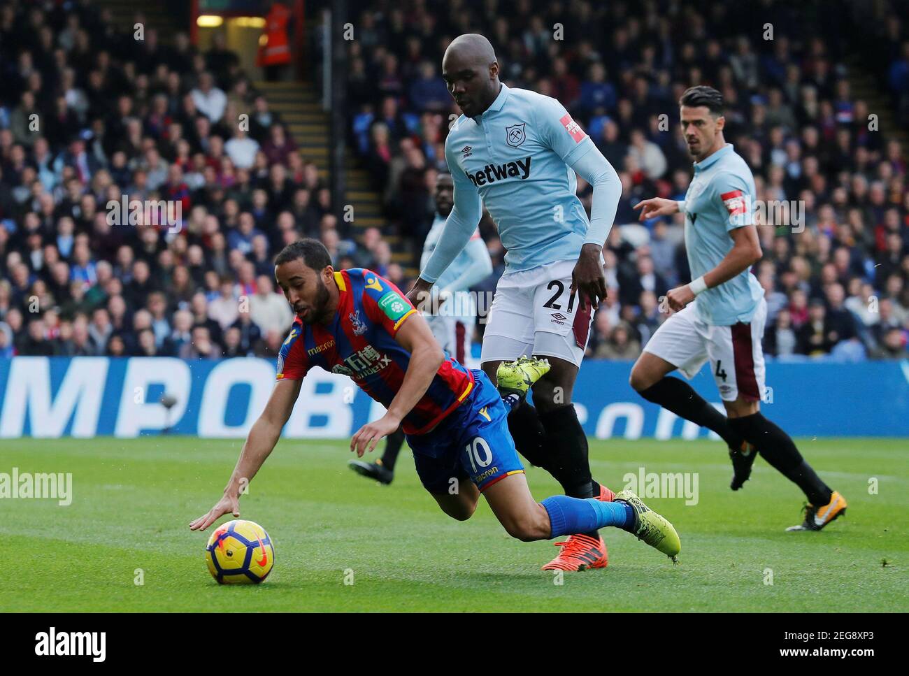 Soccer Football - Premier League - Crystal Palace vs West Ham United - Selhurst Park, London, Britain - October 28, 2017   West Ham United's Angelo Ogbonna concedes a penalty against Crystal Palace's Andros Townsend    REUTERS/Eddie Keogh    EDITORIAL USE ONLY. No use with unauthorized audio, video, data, fixture lists, club/league logos or 'live' services. Online in-match use limited to 75 images, no video emulation. No use in betting, games or single club/league/player publications. Please contact your account representative for further details.? Stock Photo