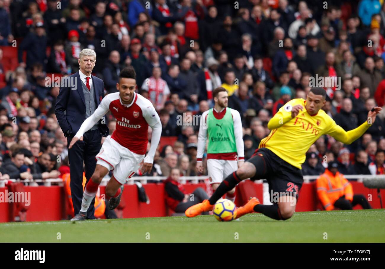 Soccer Football - Premier League - Arsenal vs Watford - Emirates Stadium, London, Britain - March 11, 2018   Arsenal manager Arsene Wenger watches Arsenal's Pierre-Emerick Aubameyang and Watford's Etienne Capoue    REUTERS/Eddie Keogh    EDITORIAL USE ONLY. No use with unauthorized audio, video, data, fixture lists, club/league logos or 'live' services. Online in-match use limited to 75 images, no video emulation. No use in betting, games or single club/league/player publications.  Please contact your account representative for further details. Stock Photo