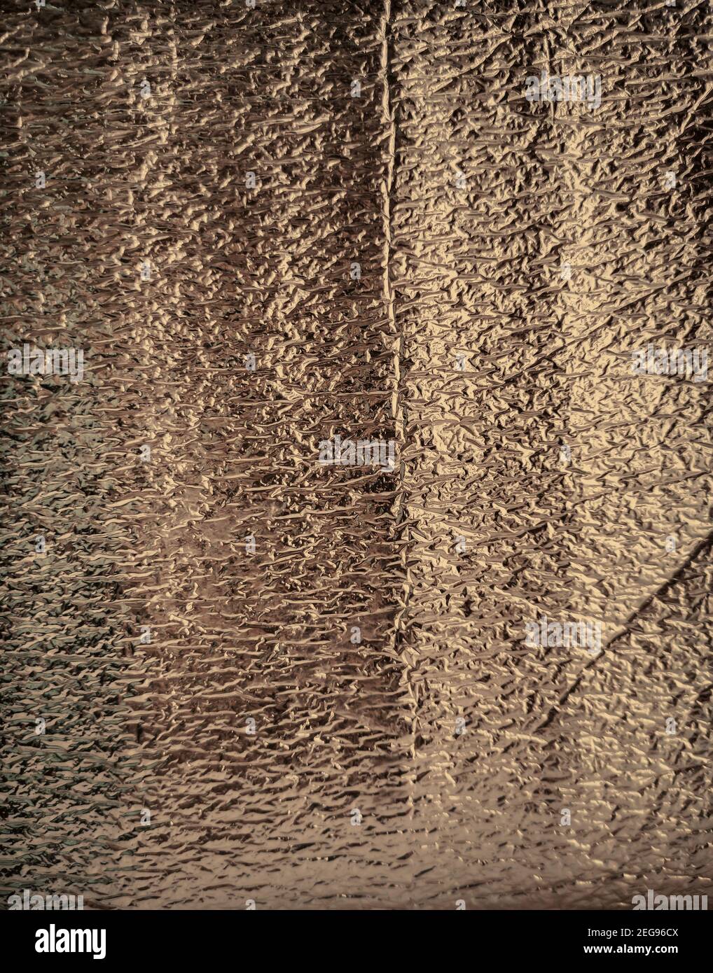 Abstract background: metal surface with shiny gold pattern Stock Photo