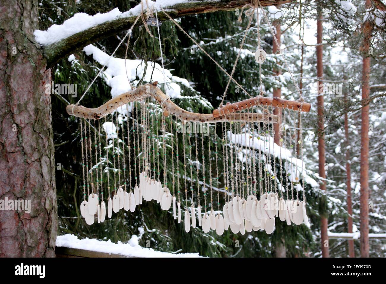 Hand made wind chimes hanging on a string with depth of field effect
