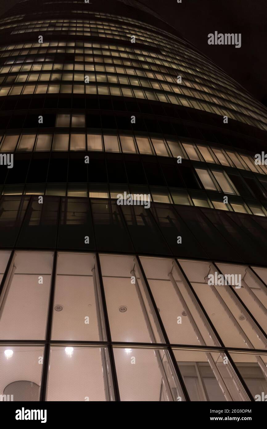 modern building in the middle of the city of bilbao at night Stock Photo