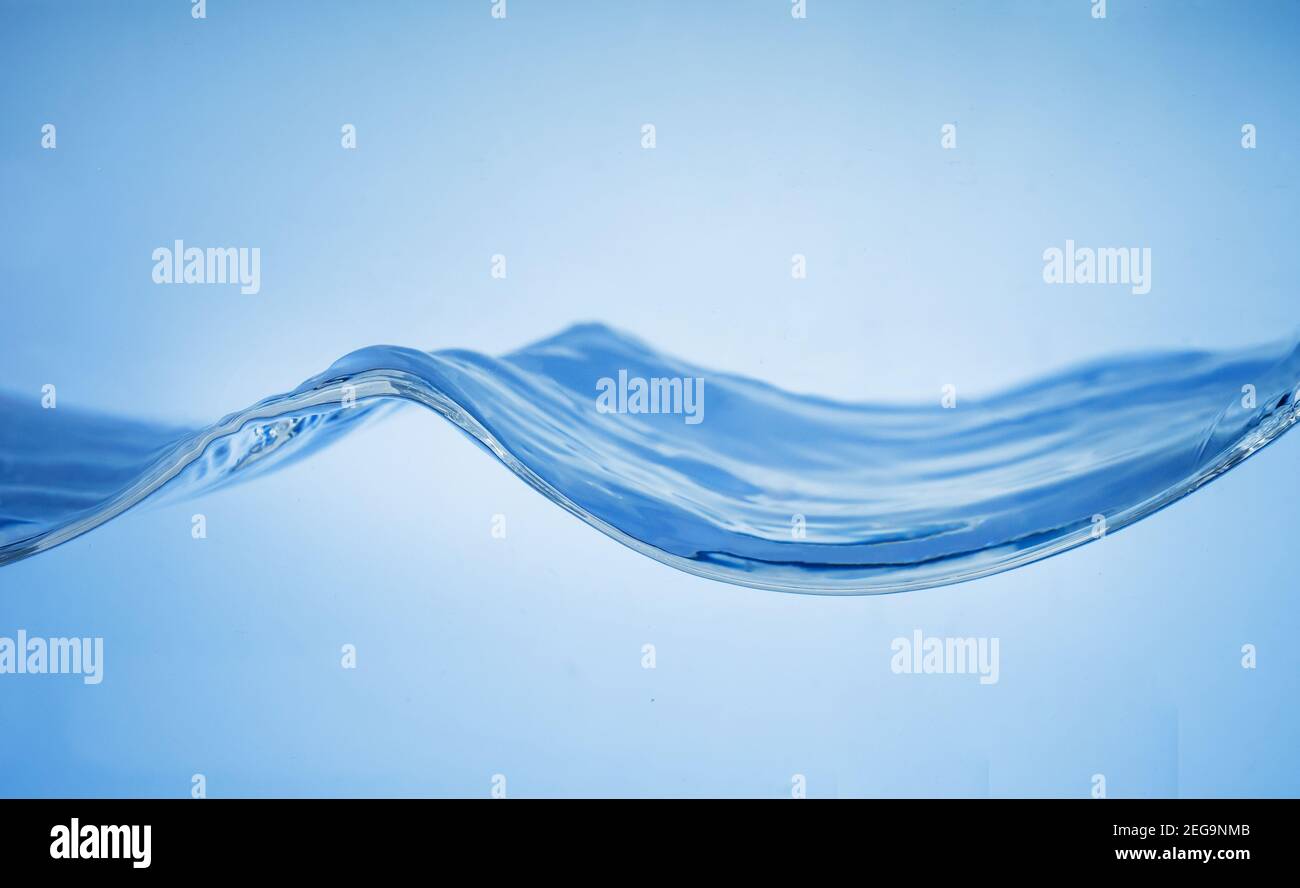 Side view of blue water waves Stock Photo - Alamy