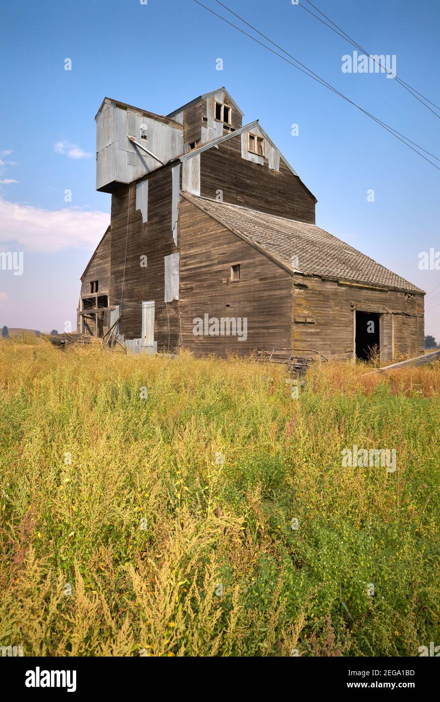 Rustic Wooden Grain Elevator. An old, abandoned, vintage wooden grain