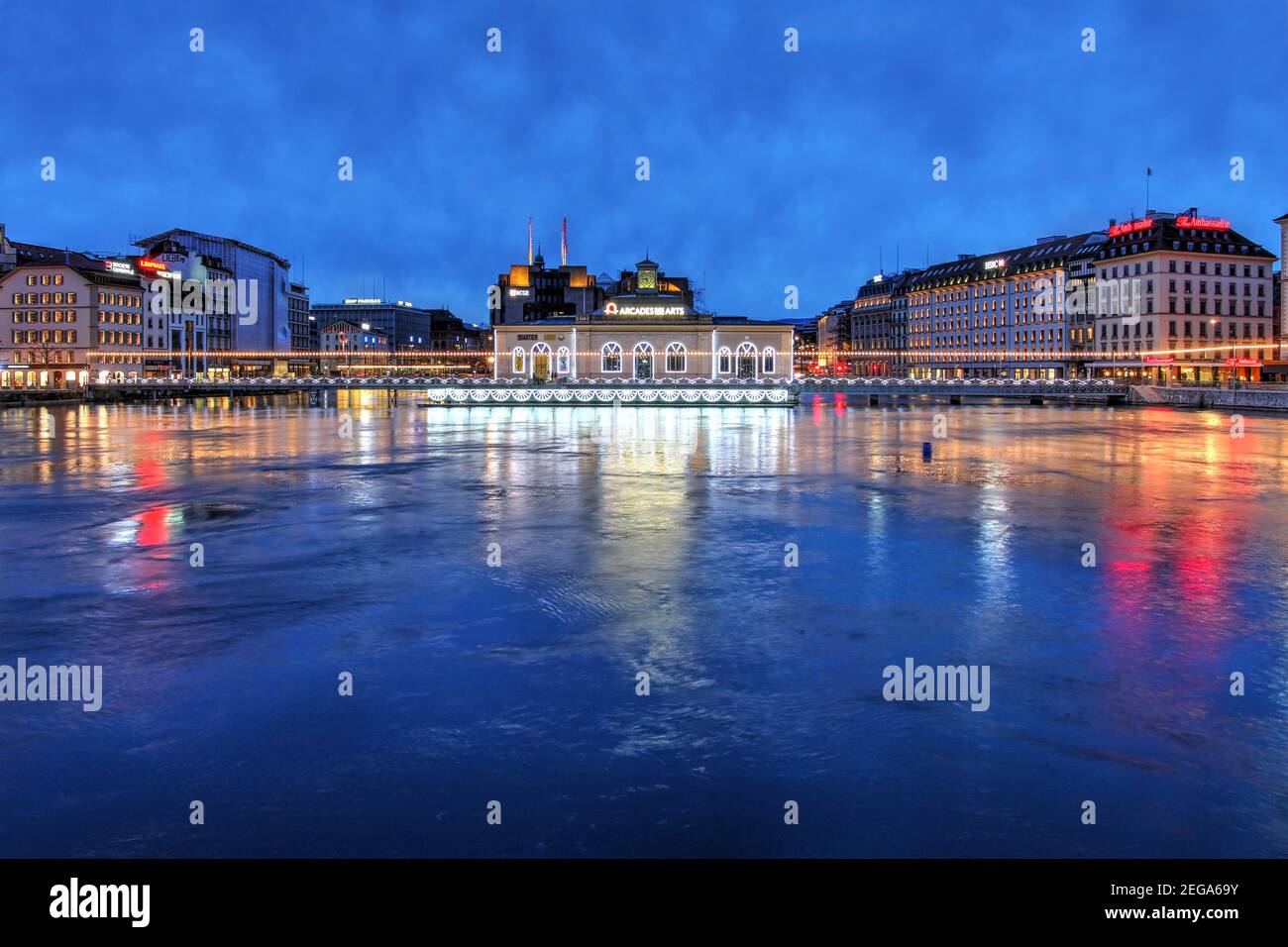 Geneva, Switzerland - January 24, 2021 - Pont de la Machine, light art installation on the bridge with the same name passing in front of the Arcades d Stock Photo