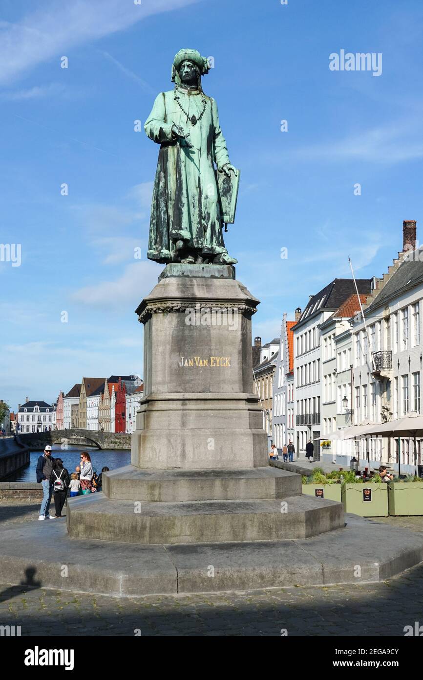 The Statue of Jan Van Eyck on Jan van Eyckplein, Jan van Eyck Square in Bruges, Belgium Stock Photo