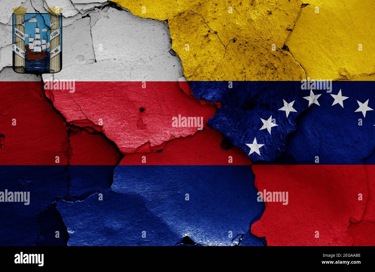 flags of Maracaibo and Venezuela painted on cracked wall Stock Photo