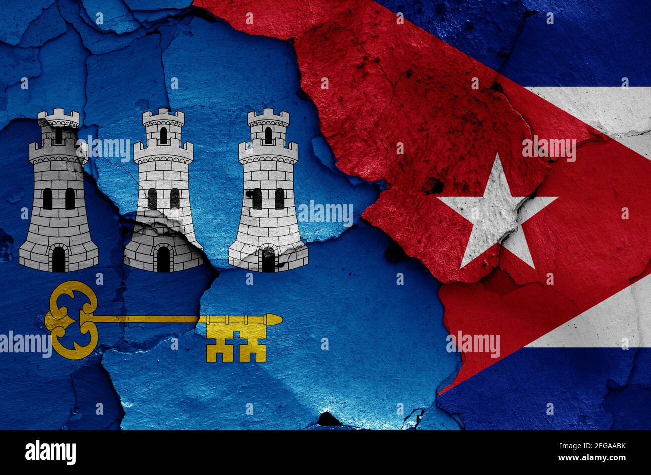 flags of Havana and Cuba painted on cracked wall Stock Photo