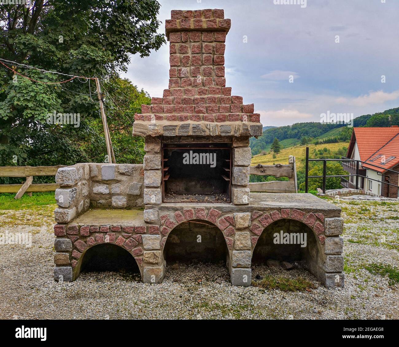 Big grill near grill hut made with brick and stones Stock Photo