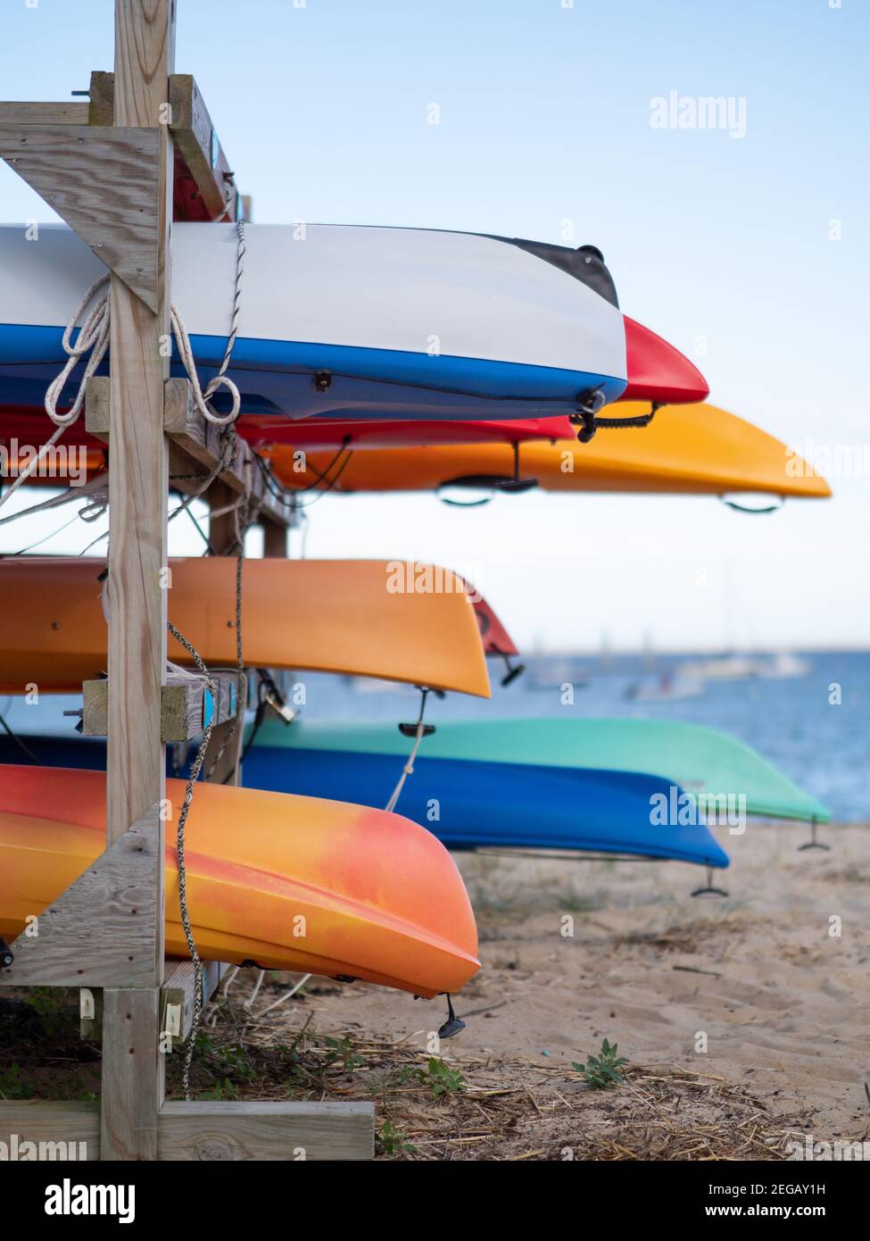 Image of kayaks stored on the beach Stock Photo - Alamy