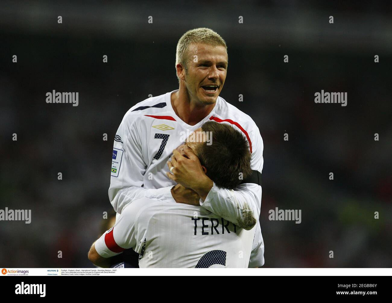 Football action scoring david beckham hires stock photography and