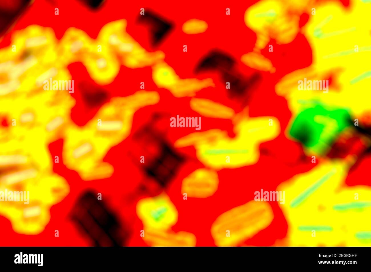 Brightly coloured red and and yellow abstract background formed by blurred lights Stock Photo
