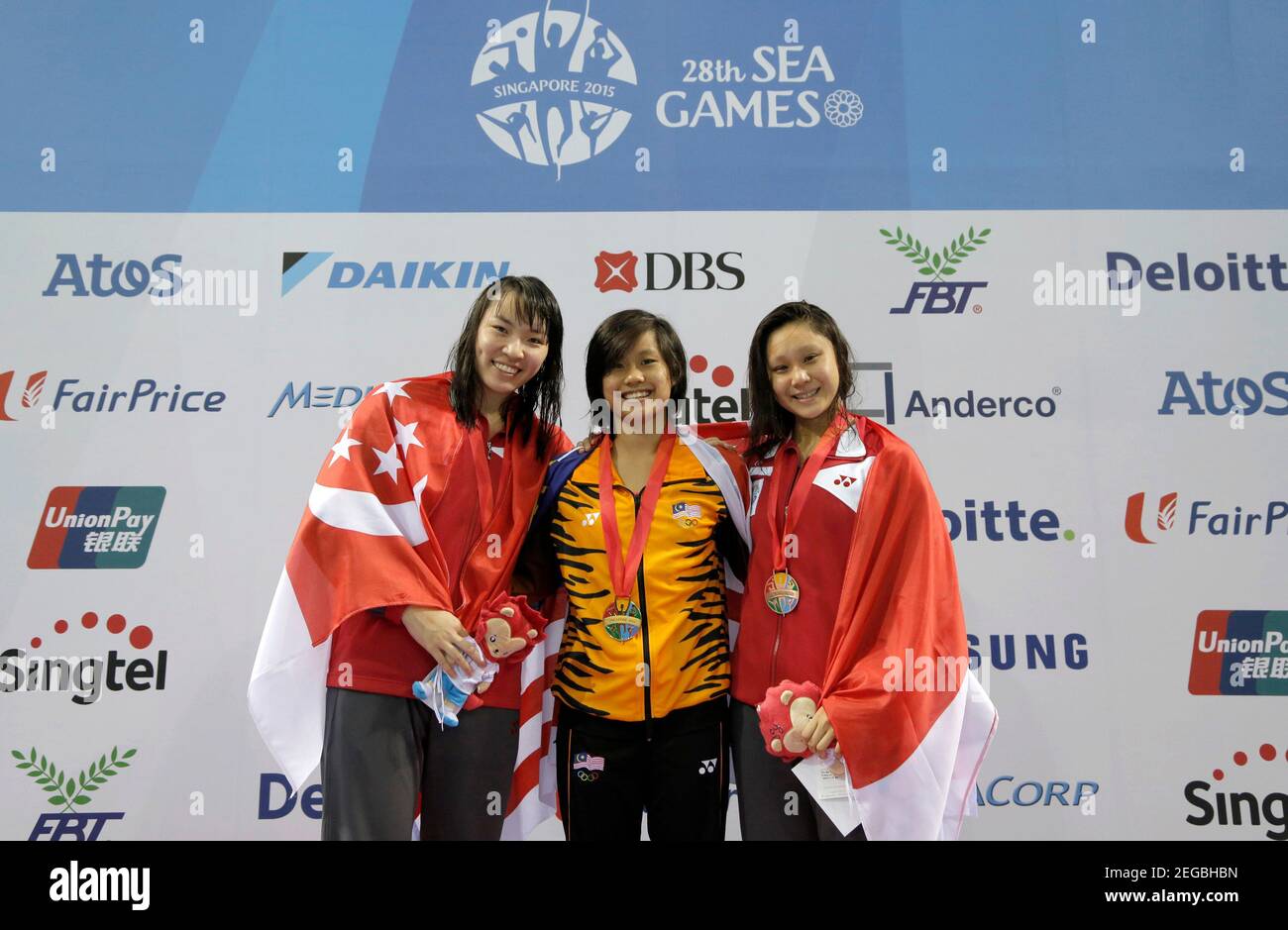 28th SEA Games Singapore 2015 - OCBC Aquatic Centre, Singapore - 8/6/15  Swimming - Women's 100m Breaststroke - Final - (L-R) Singapore's Ho Ru'En  Roanne, Malaysia's Phee Jinq En and Singapore's Samantha