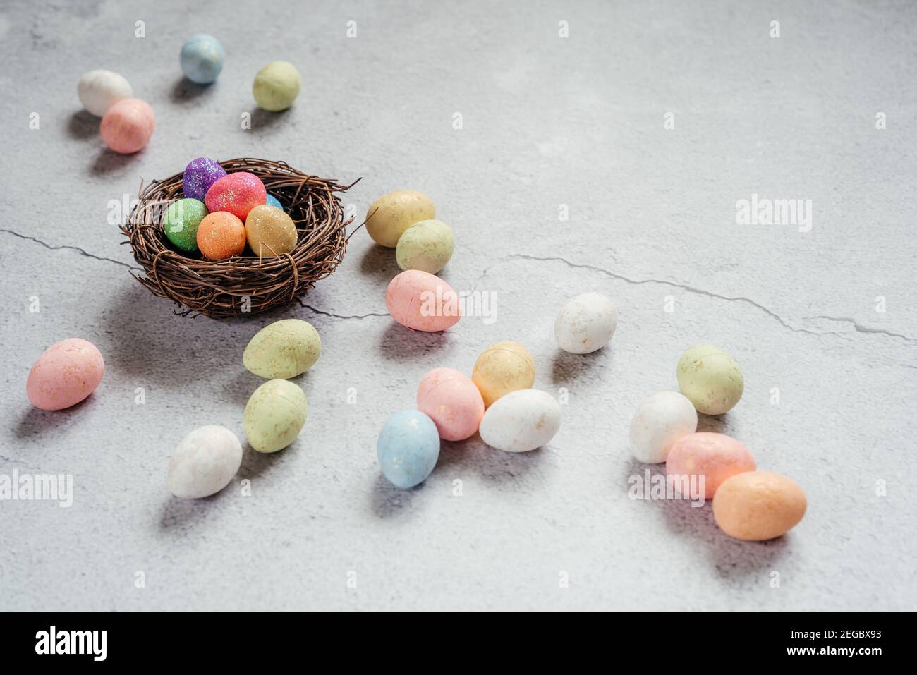 Colourful Easter eggs on gray cement background Stock Photo