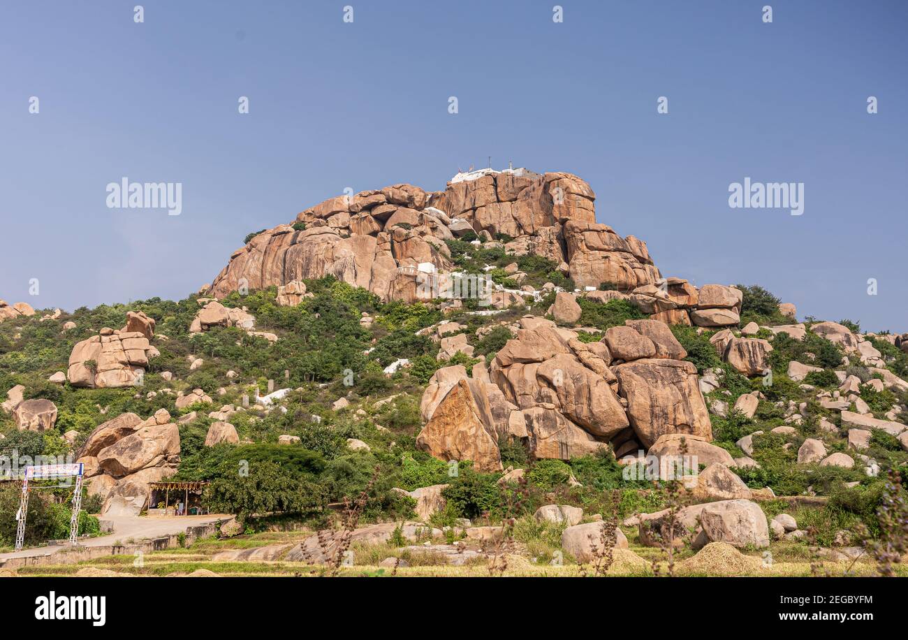 Hunumanahalli, Karnataka, India - November 9, 2013: Kishkinda, Anjanadri Hill, Anjaneya Parvat, the birthplace of Hanuman God now a white temple on to Stock Photo