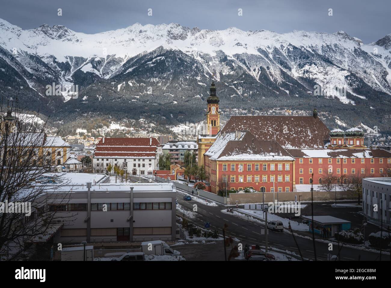 Wilten Abbey and Alps mountains - Innsbruck, Tyrol, Austria Stock Photo