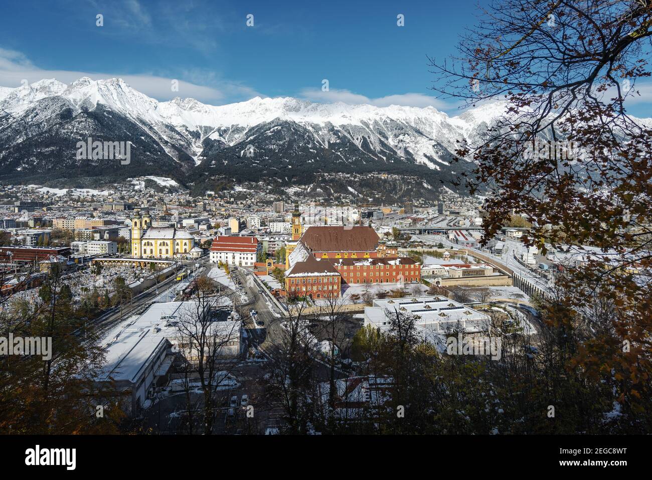 Aerial view of Innsbruck with Wilten Abbey and Alps mountains - Innsbruck, Tyrol, Austria Stock Photo