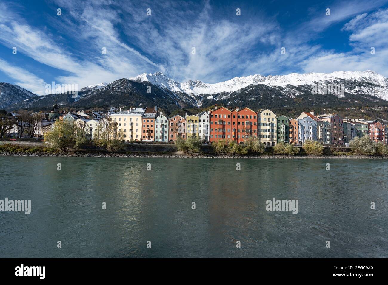 Colorful houses and Alps Mountains - Innsbruck, Tyrol, Austria Stock Photo