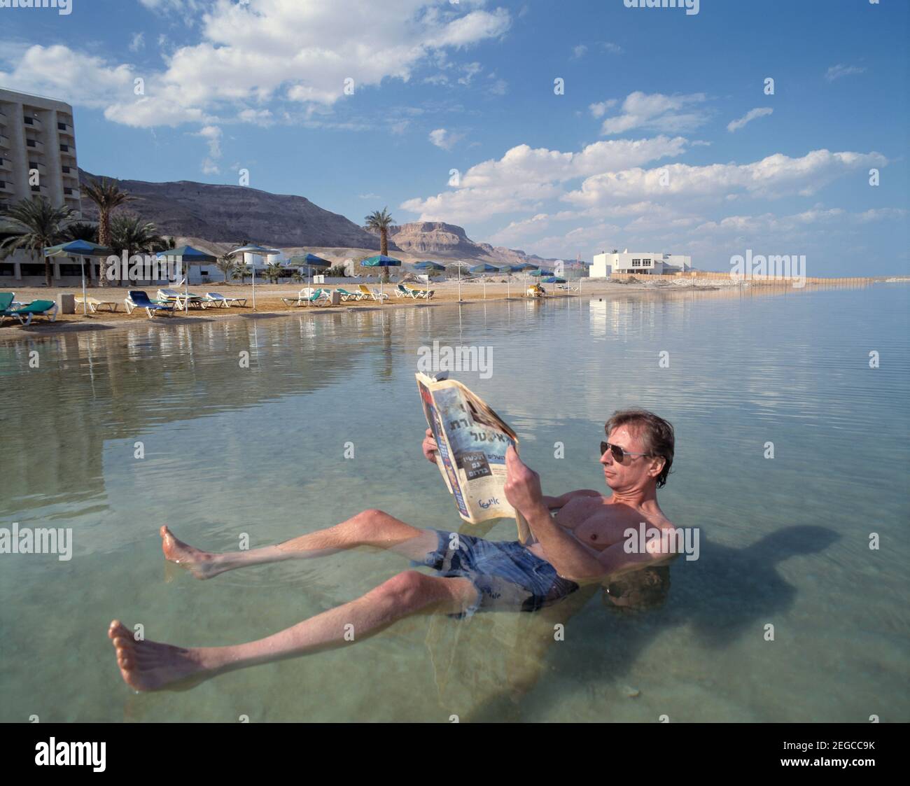 israel-dead-sea-man-reading-a-newspaper-while-floating-on-his-back