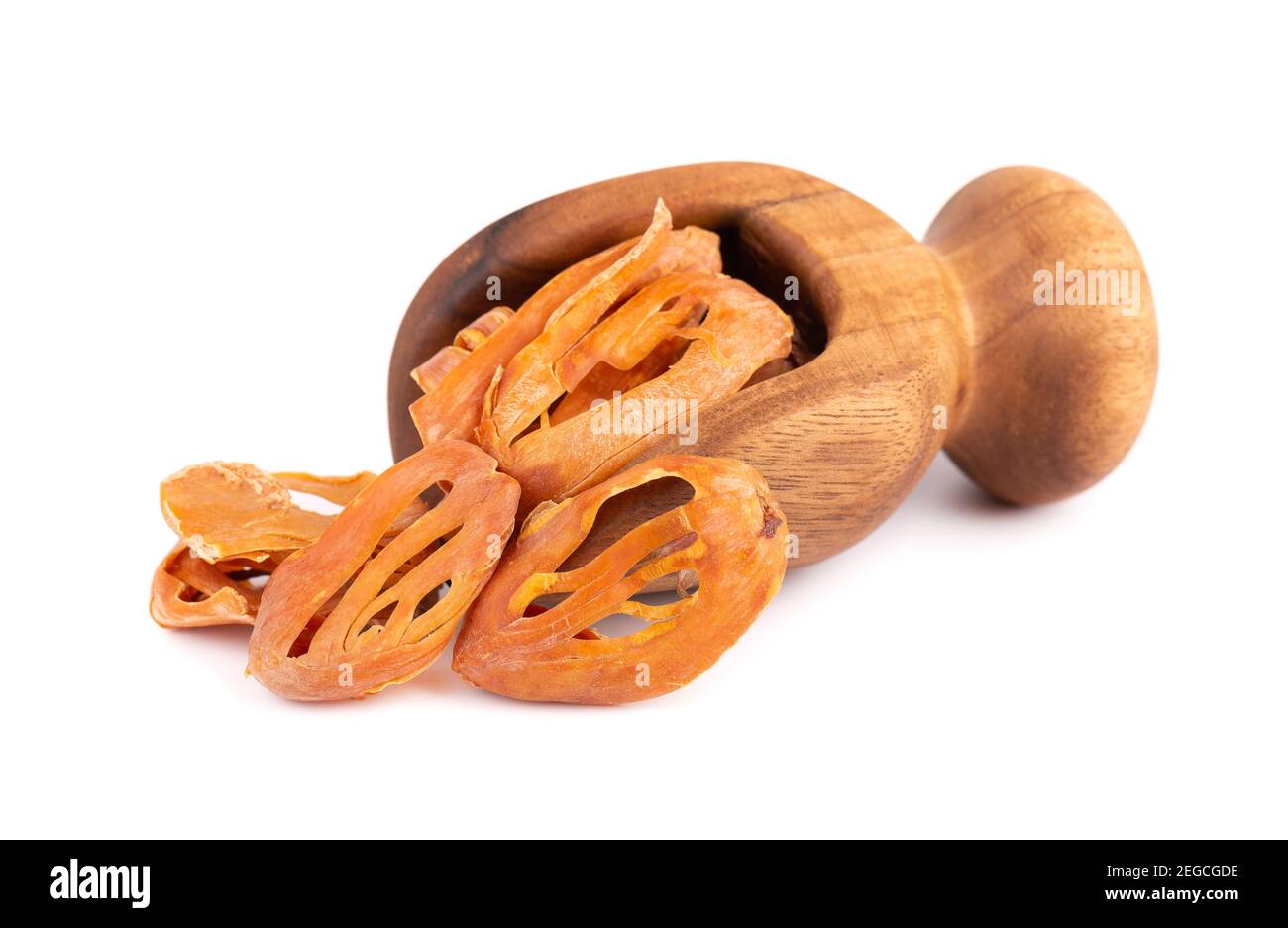 Mace in a wooden scoop, isolated on white background. Nutmeg flower