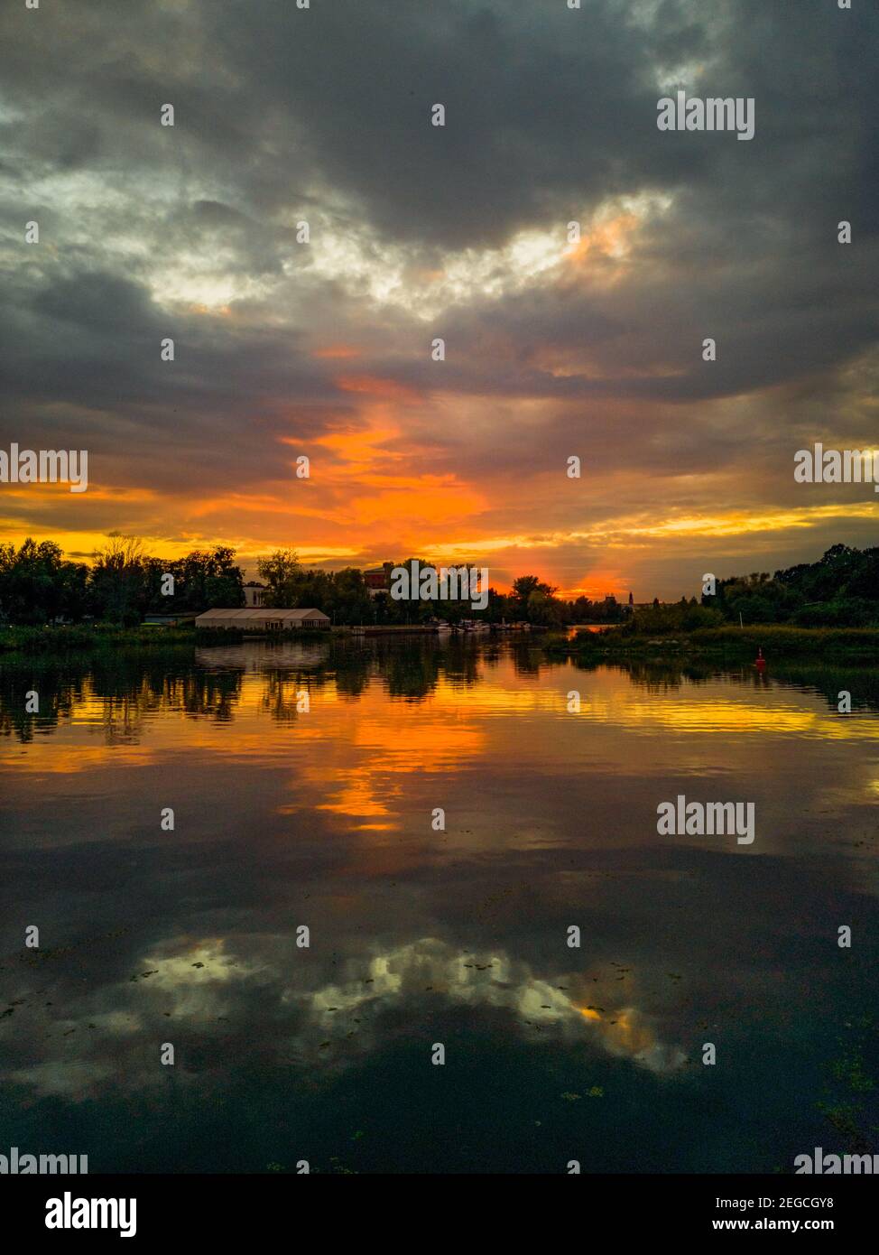 Sunset sky reflecting in water hi-res stock photography and images - Alamy