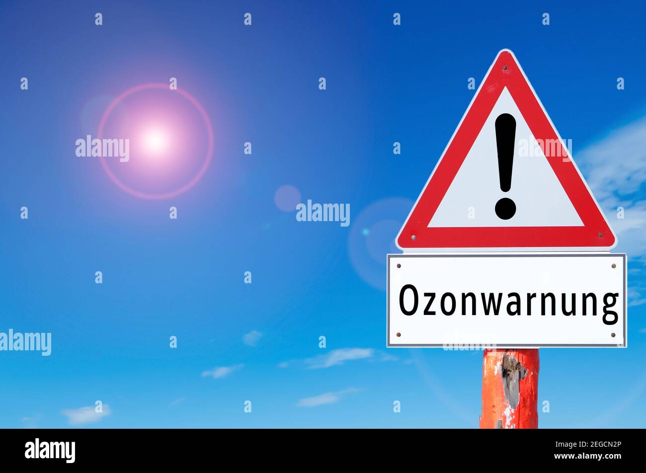 Warning sign ozone warning on blue background in german Stock Photo
