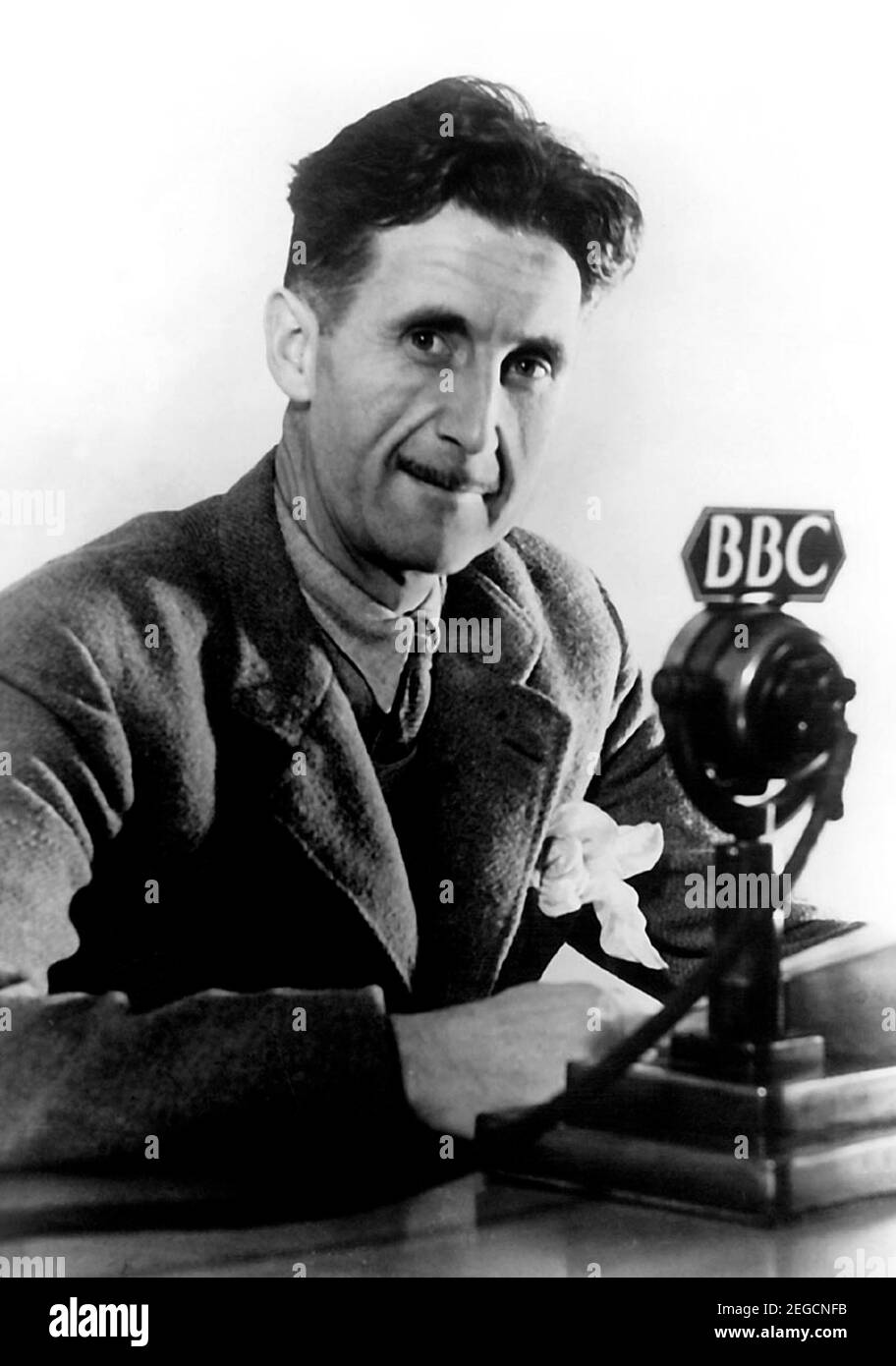 George Orwell. Portrait of the English novelist and journalist, Eric Arthur Blair ( 1903- 1950), talking on the BBC in 1940 Stock Photo