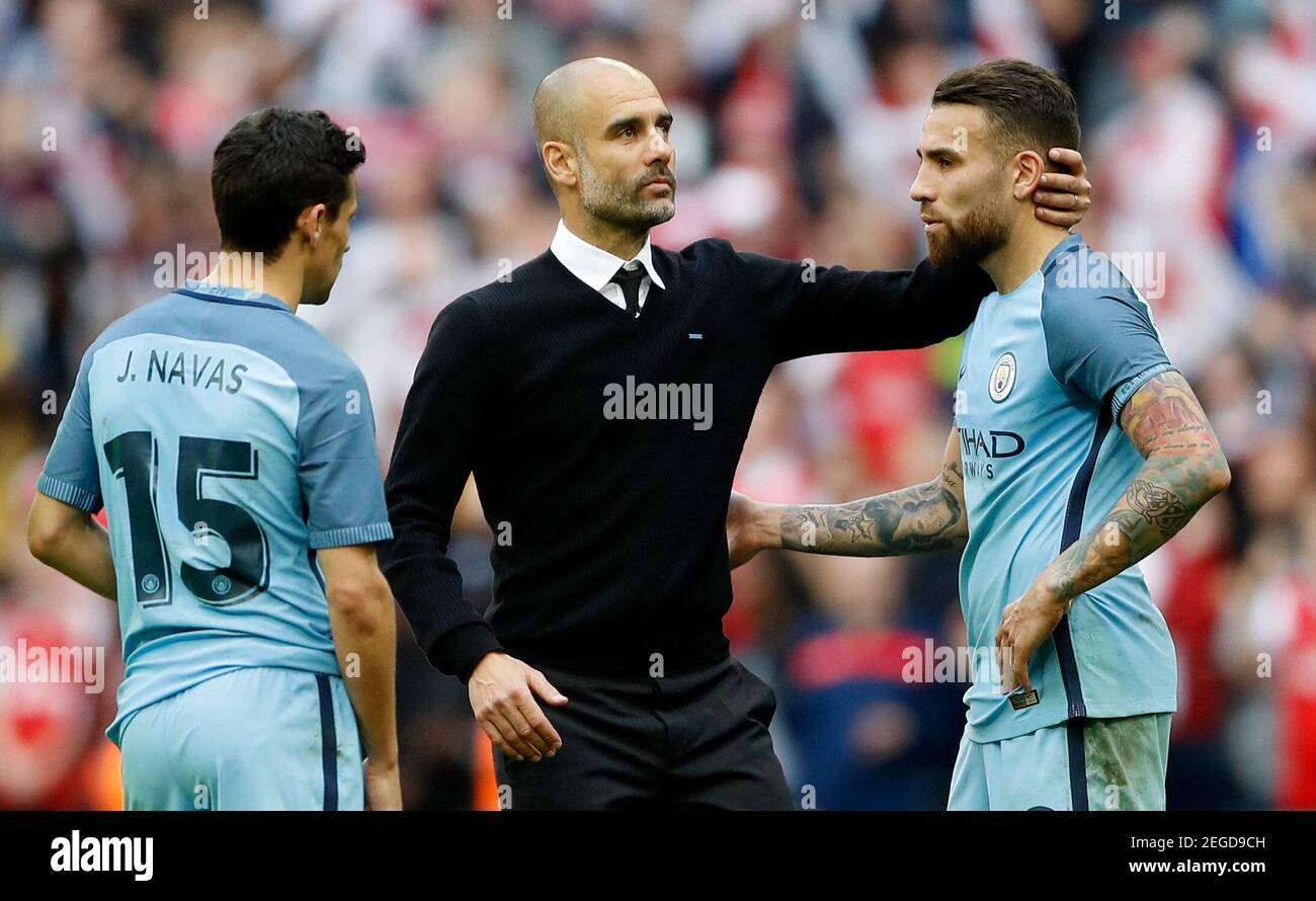 Britain Football Soccer Arsenal V Manchester City Fa Cup Semi Final Wembley Stadium 23 4 17 Manchester City Manager Pep Guardiola Jesus Navas And Nicolas Otamendi Look Dejected After The